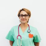 Headshot of a smiling practitioner named Andrei Popescu.